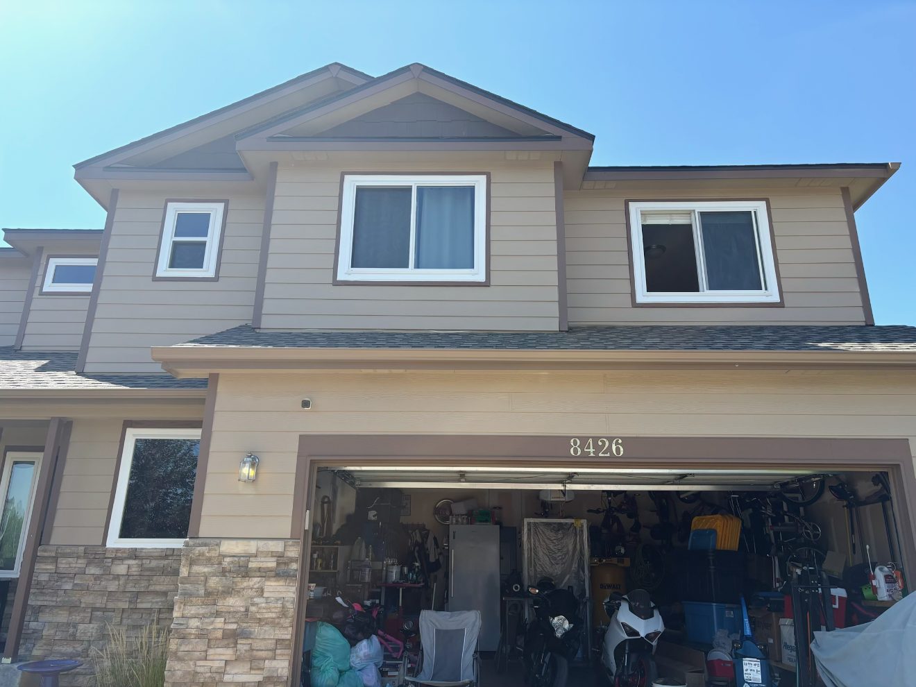 Newly installed replacement windows on the front of a Colorado home